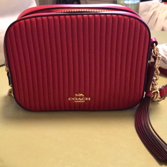 coach red quilted camera bag